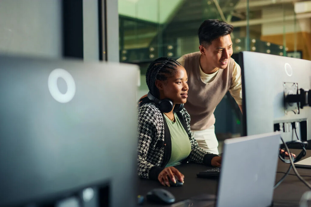 Two students working on a computer